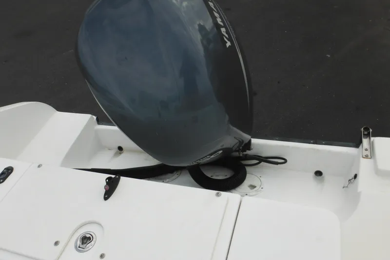 Slide: The Image of 2006 Seaswirl Striper 2301 Dual Console O/B with Yamaha outboard motor. - 14