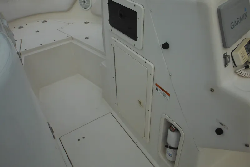 Slide: The Image of 2006 Seaswirl Striper 2301 Dual Console O/B interior with Garmin equipment. - 41