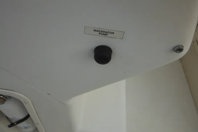 Slide: The Image of Macerator pump control on 2006 Seaswirl Striper 2301 Dual Console O/B boat. - 42