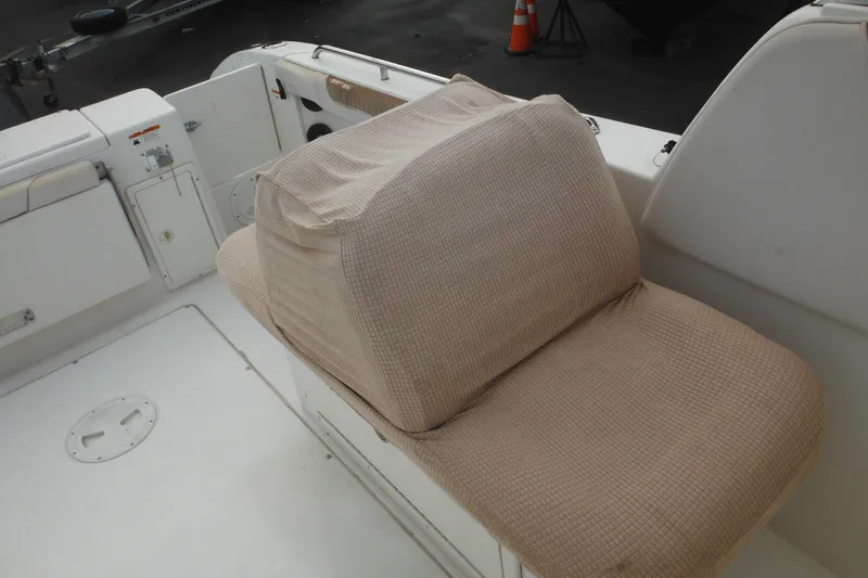 Slide: The Image of 2006 Seaswirl Striper 2301 Dual Console O/B boat interior seating area. - 46