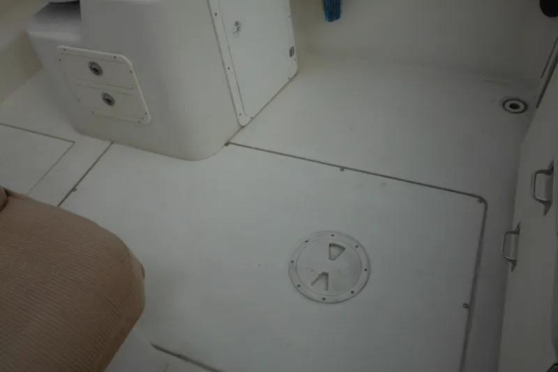 Slide: The Image of 2006 Seaswirl Striper 2301 Dual Console O/B boat interior deck view. - 48