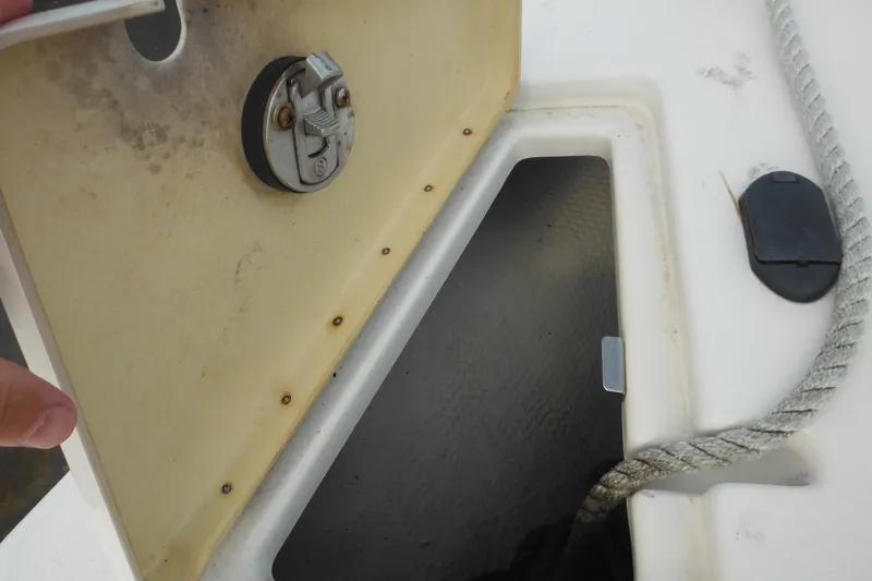 Slide: The Image of Open hatch on 2006 Seaswirl Striper 2301 Dual Console O/B boat deck. - 56
