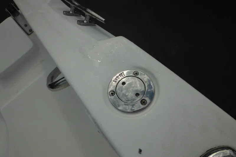 Slide: The Image of Close-up of a 2006 Seaswirl Striper 2301 boat deck detail with metal fittings. - 58