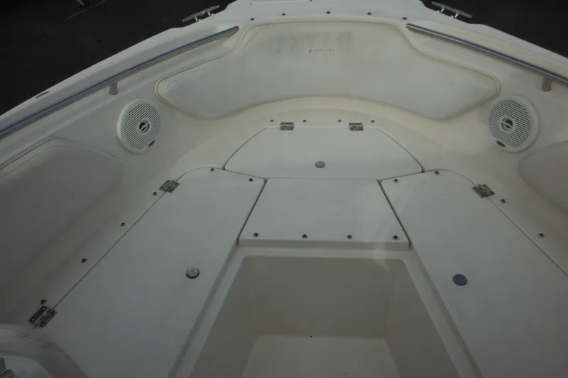 Slide: The Image of 2006 Seaswirl Striper 2301 Dual Console O/B boat interior with storage compartments. - 60