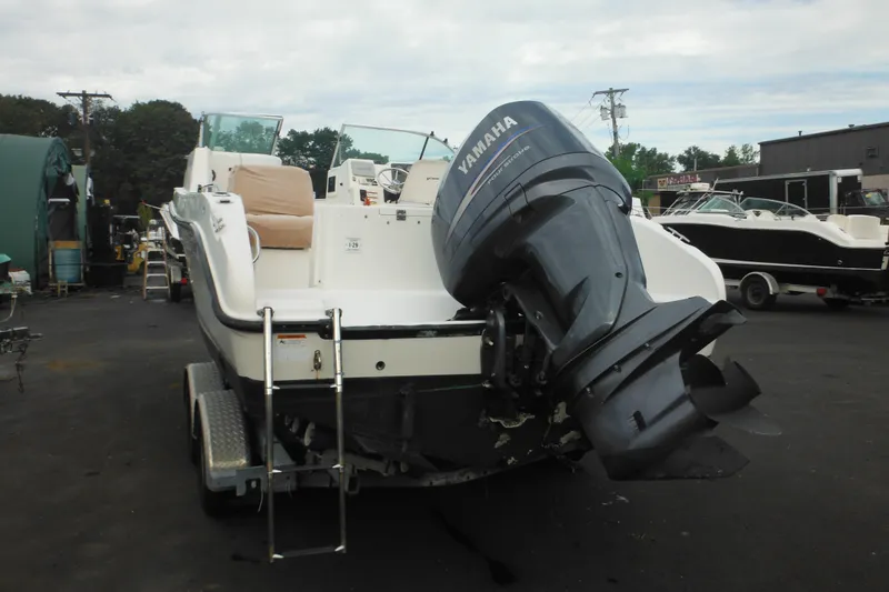 Slide: The Image of 2006 Seaswirl Striper 2301 Dual Console O/B with Yamaha outboard motor. - 7