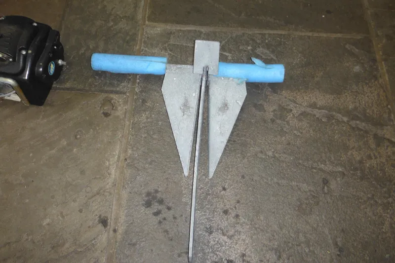 Slide: The Image of Anchor on stone floor, related to 2006 Seaswirl Striper 2301 Dual Console O/B. - 75