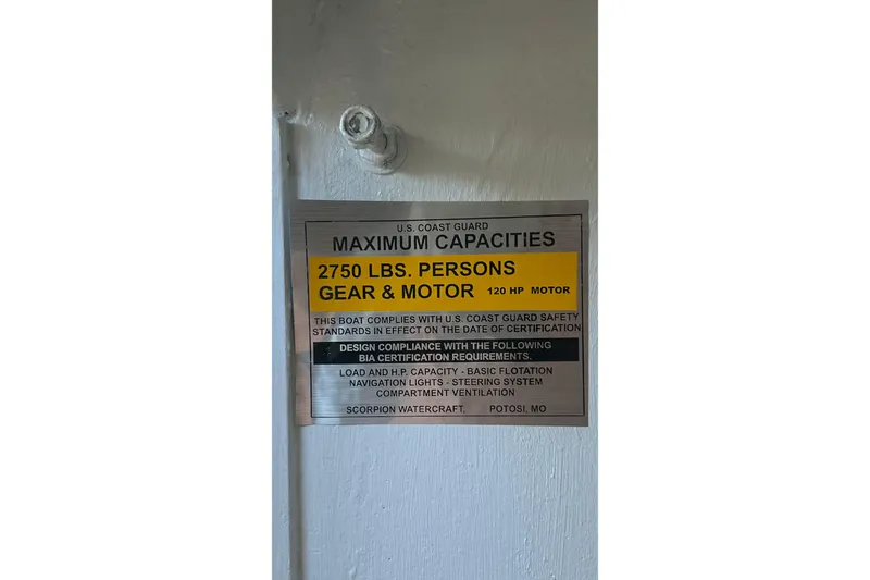 Slide: The Image of Scorpion Lynx 2002 boat capacity plate, 2750 lbs, 120 HP motor, US Coast Guard compliant. - 17