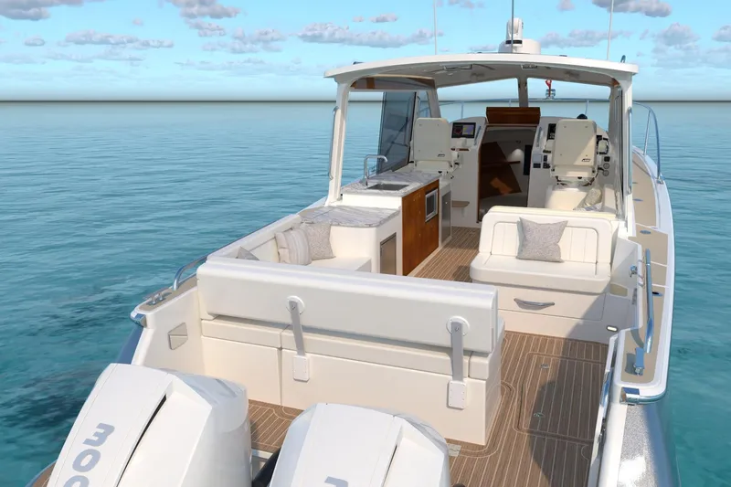Slide: The Image of Luxury MJM 38R 2026 yacht with spacious deck and modern amenities on calm sea. - 4