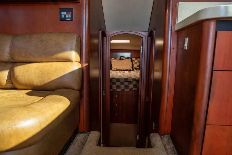 Slide: The Image of Interior of 2004 Luhrs 36 Convertible yacht with cozy cabin and leather seating. - 39
