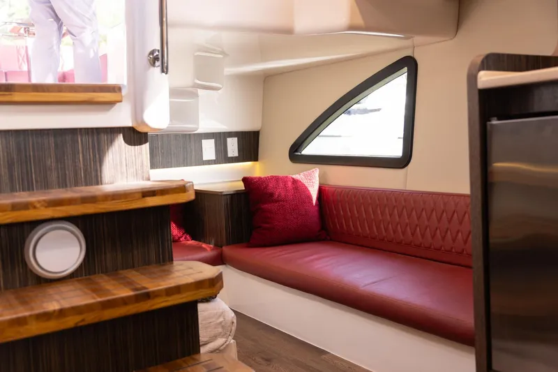 Slide: The Image of Luxurious interior of 2026 Hanover 387 yacht with red seating and modern design. - 15