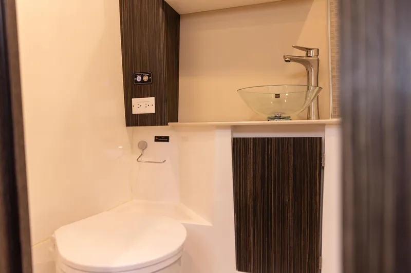 Slide: The Image of Modern bathroom in 2026 Hanover 387 with glass sink and sleek design. - 18