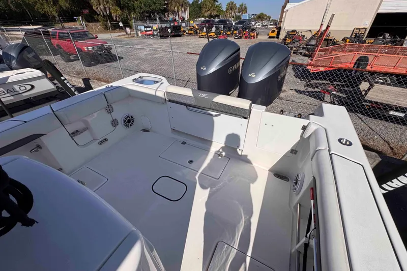 Slide: The Image of 2020 Tidewater 320 CC Adventure boat interior with dual Yamaha engines. - 24