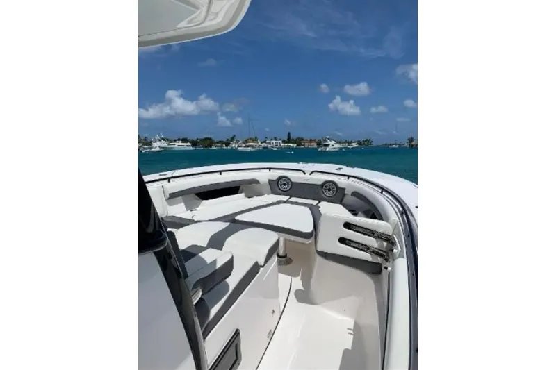 Slide: The Image of 2020 Tidewater 320 CC Adventure boat interior with ocean view and clear blue sky. - 3