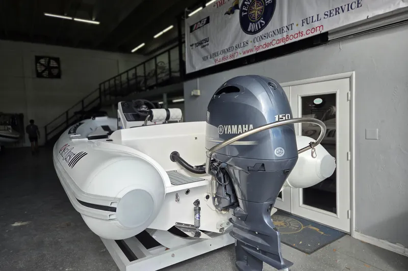 Slide: The Image of Novurania Como 18 boat with Yamaha 150 engine in showroom, 2021 model. - 7