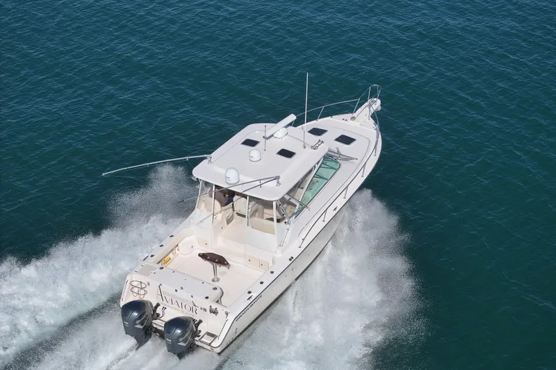 Slide: The Image of 2008 Grady-White Express 360 boat cruising on open water, aerial view. - 15