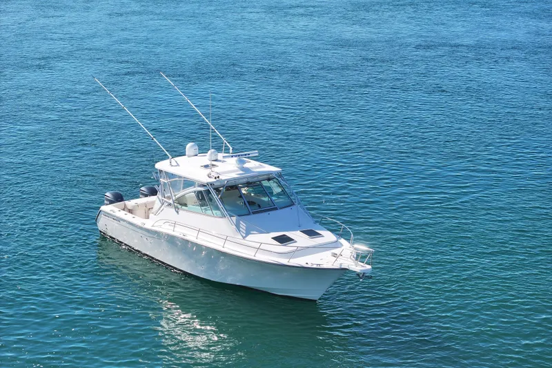 Slide: The Image of 2008 Grady-White Express 360 boat on clear blue water. - 23