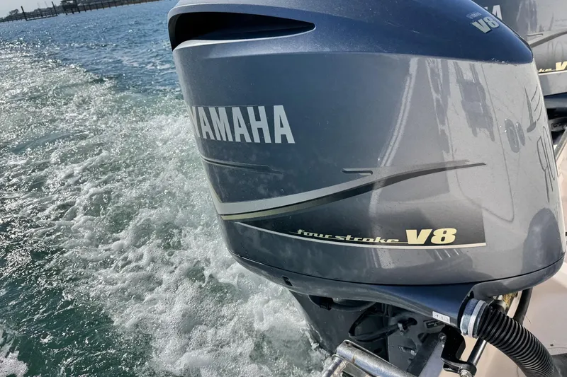 Slide: The Image of Yamaha V8 four-stroke engine on 2008 Grady-White Express 360 boat, cruising on water. - 26