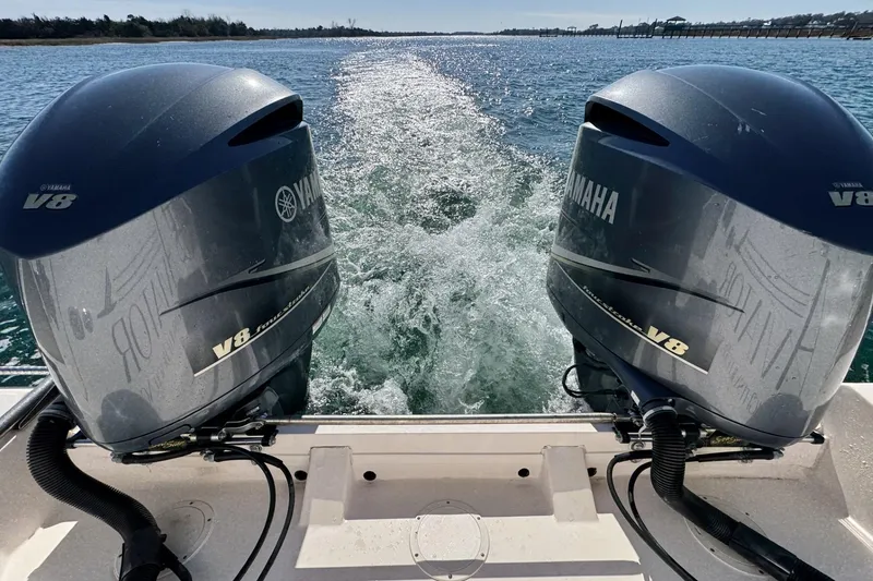 Slide: The Image of 2008 Grady-White Express 360 with twin Yamaha V8 outboard engines on open water. - 27