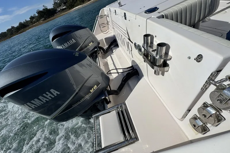 Slide: The Image of 2008 Grady-White Express 360 boat with twin Yamaha V8 engines on water. - 28