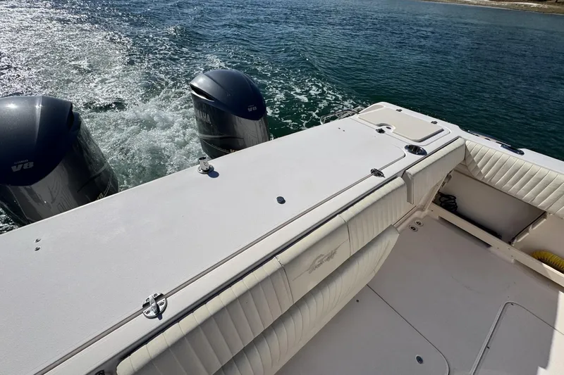 Slide: The Image of 2008 Grady-White Express 360 boat with twin Yamaha V8 engines on open water. - 29
