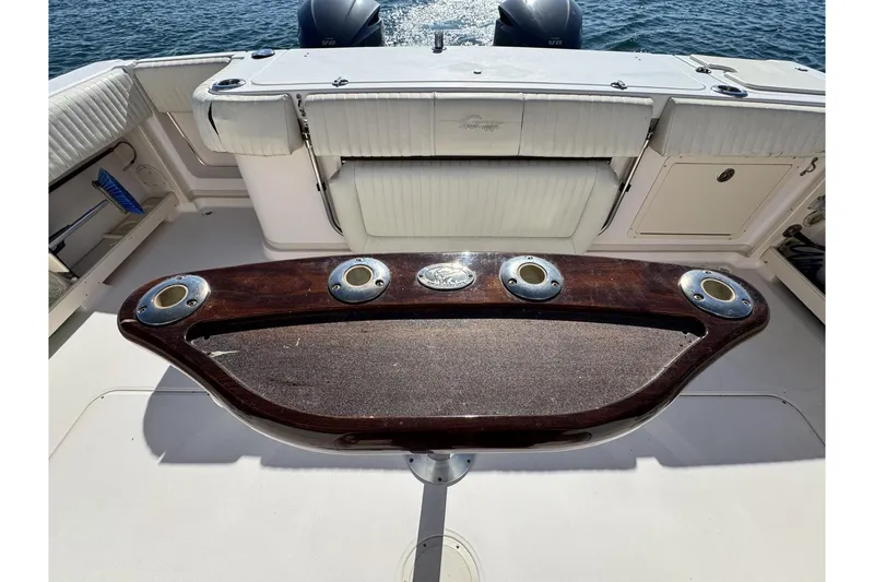 Slide: The Image of 2008 Grady-White Express 360 boat deck with fishing rod holders and seating. - 30