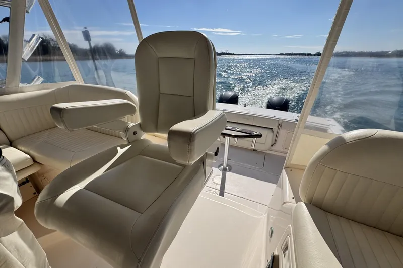 Slide: The Image of 2008 Grady-White Express 360 boat interior with luxurious seating and ocean view. - 36