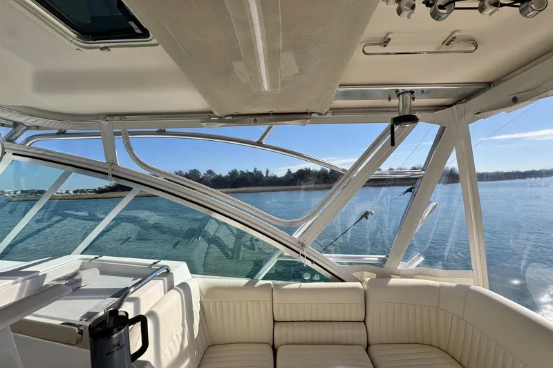 Slide: The Image of Interior view of 2008 Grady-White Express 360 boat with scenic water backdrop. - 40