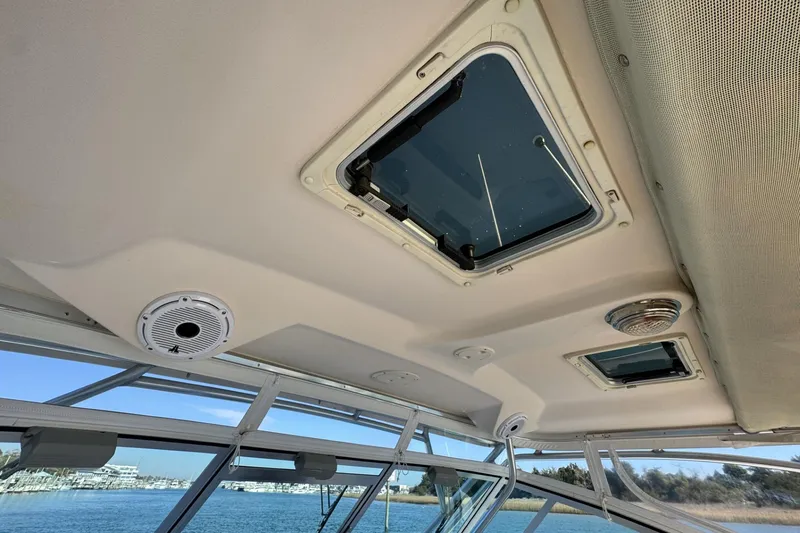 Slide: The Image of Interior view of 2008 Grady-White Express 360 boat ceiling with hatches and speakers. - 42