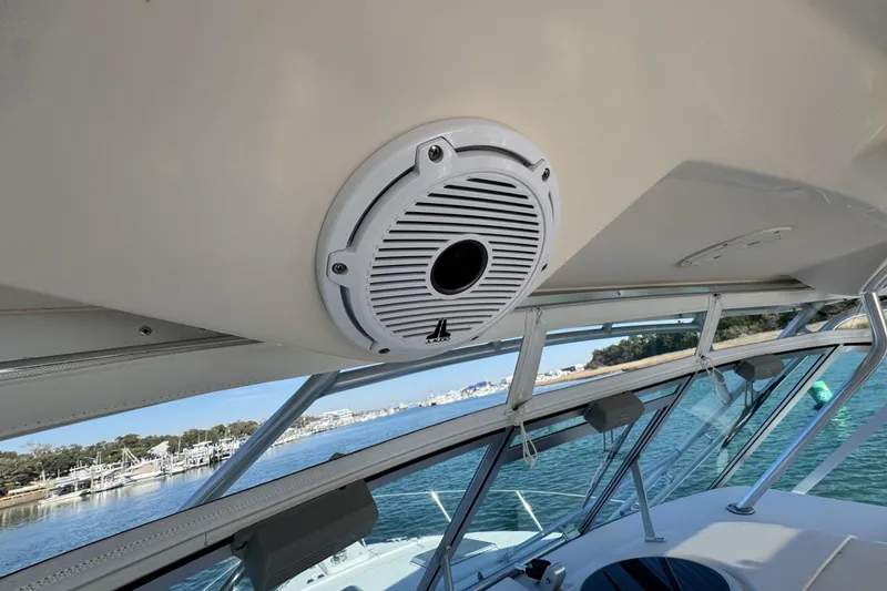 Slide: The Image of 2008 Grady-White Express 360 boat interior with speaker and ocean view. - 43