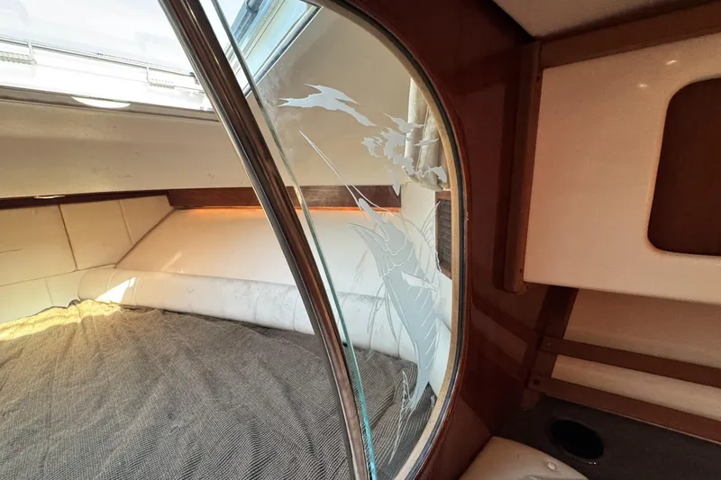 Slide: The Image of 2008 Grady-White Express 360 cabin interior with etched glass detail. - 52