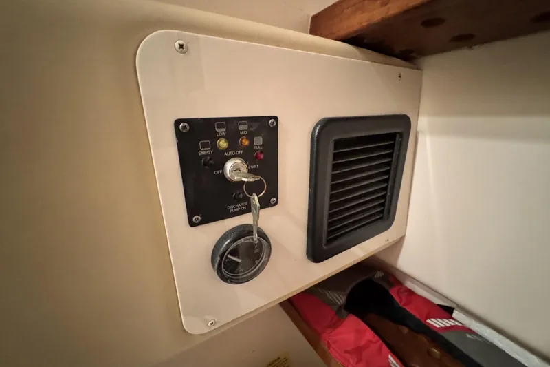 Slide: The Image of Control panel and vent inside 2008 Grady-White Express 360 boat cabin. - 58
