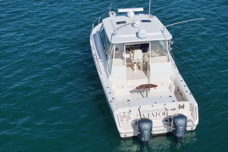 Slide: The Image of 2008 Grady-White Express 360 boat on open water, rear view. - 9