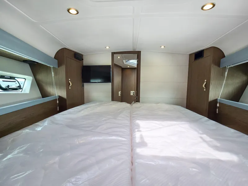 Slide: The Image of Luxurious cabin interior of 2019 Beneteau Gran Turismo 40 yacht with modern amenities. - 16