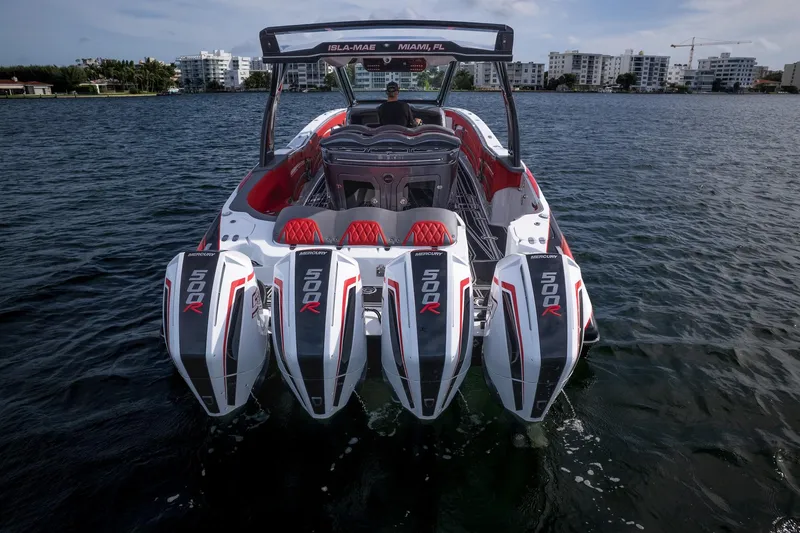 Slide: The Image of 2024 MTI V42 boat with four powerful Mercury 500R engines on the water. - 5