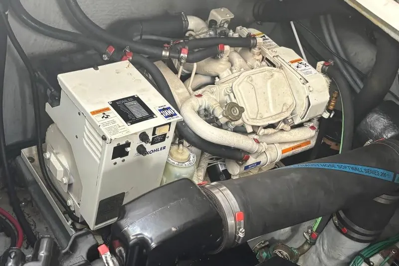 Slide: The Image of Engine compartment of a 1996 Sea Ray 330 Sundancer with Kohler generator. - 8