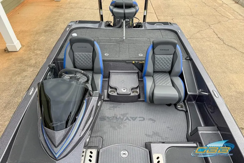 Slide: The Image of 2023 Caymas CX 21 PRO boat interior with dual seats and steering console. - 11