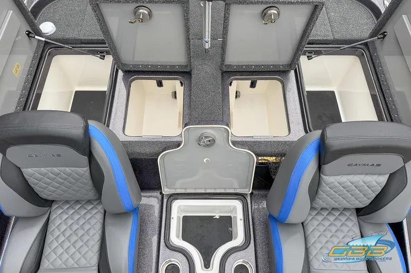 Slide: The Image of 2023 Caymas CX 21 PRO boat interior with storage compartments and seating. - 12