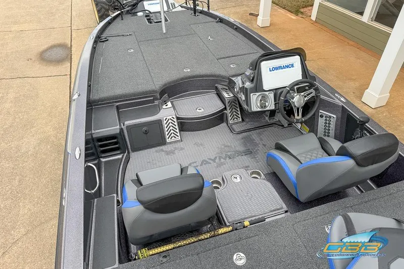 Slide: The Image of 2023 Caymas CX 21 PRO boat interior with dual seats and advanced navigation system. - 16