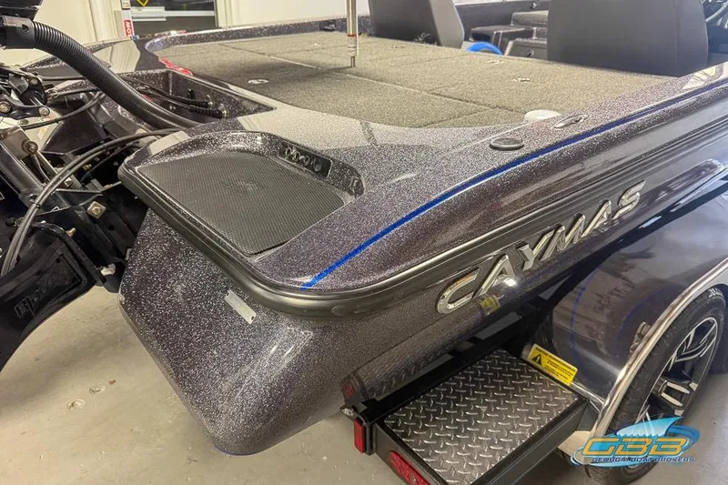 Slide: The Image of 2023 Caymas CX 21 PRO boat rear view with sleek design and metallic finish. - 18