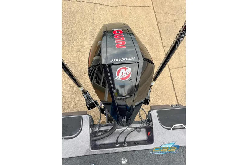 Slide: The Image of 2023 Caymas CX 21 PRO with Mercury engine, top view on concrete surface. - 26