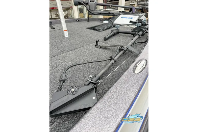 Slide: The Image of 2023 Caymas CX 21 PRO boat deck with Lowrance equipment and fishing gear. - 28