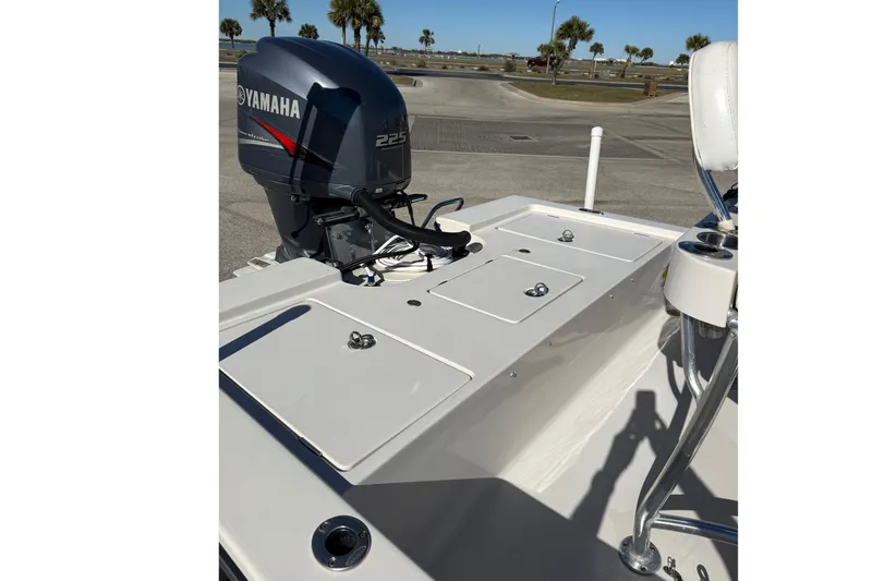 Slide: The Image of 2008 Pathfinder 2200 Tournament Edition boat with Yamaha 225 engine, docked outdoors. - 10