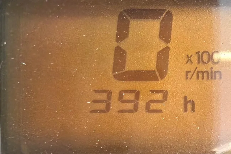 Slide: The Image of Digital display showing 392 hours on a 2008 Pathfinder 2200 Tournament Edition. - 16