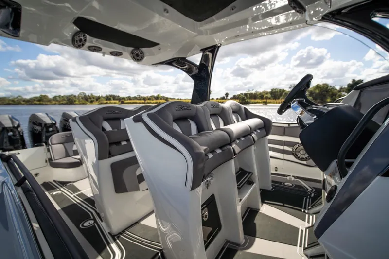 Slide: The Image of Luxury interior of 2020 MTI V42 boat with plush seating and modern design. - 14