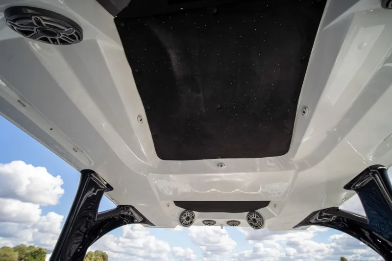 Slide: The Image of Underside view of 2020 MTI V42 boat with speakers and sky background. - 29