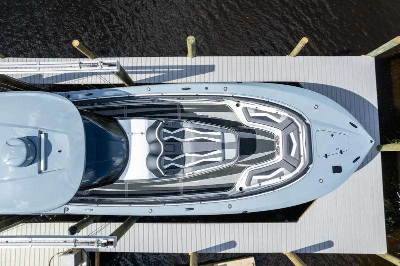 Slide: The Image of Overhead view of 2020 MTI V42 boat docked on water. - 57