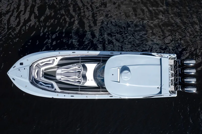 Slide: The Image of Aerial view of 2020 MTI V42 boat on dark water. - 75