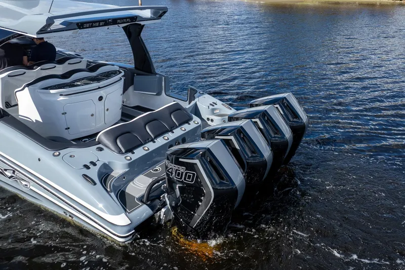 Slide: The Image of Luxury MTI V42 boat with multiple powerful engines on water, 2020 model. - 79