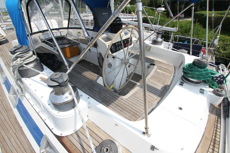 Slide: The Image of Cockpit of 1990 Nautor Swan 61 sailboat with steering wheel and winches. - 16