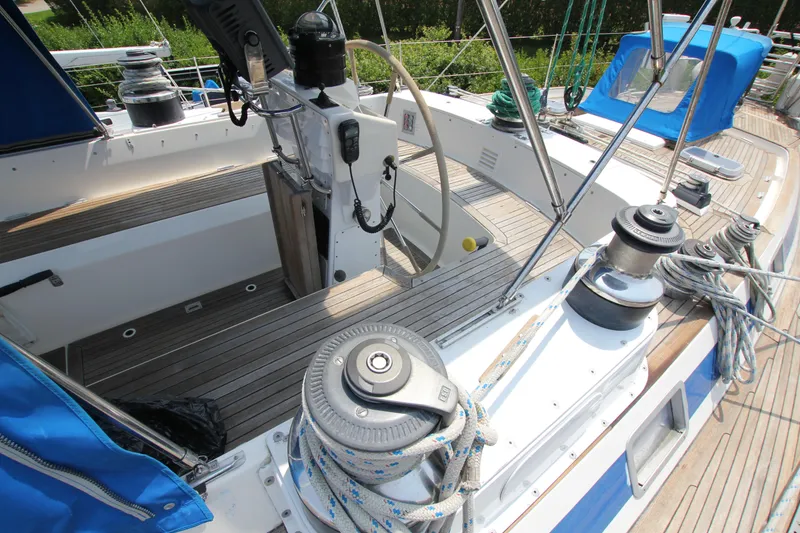 Slide: The Image of Cockpit of 1990 Nautor Swan 61 sailboat with winches and ropes. - 17